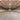 Indoor livestock arena with wooden trusses and bright led lighting