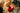 red top hat light fixture with a black electrical cord